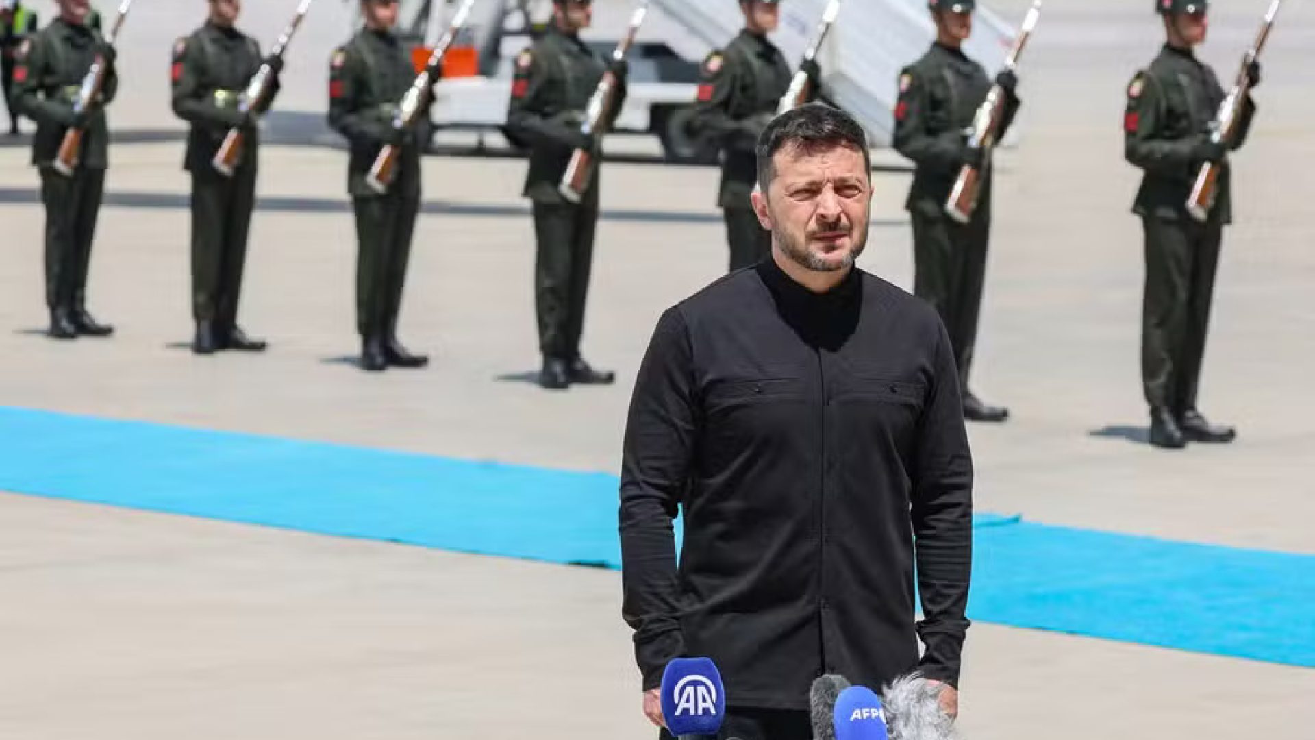 111052981-ukrainian-president-volodymyr-zelensky-speaks-to-media-after-disembarking-from-the-plane-u.jpeg
