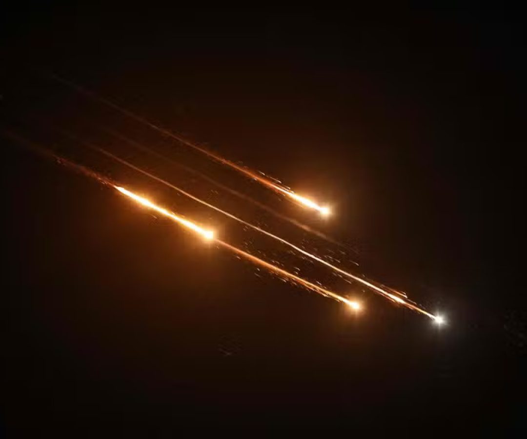111397791-debris-of-missiles-fired-from-iran-toward-israel-leave-trails-in-the-night-sky-over-na.jpg