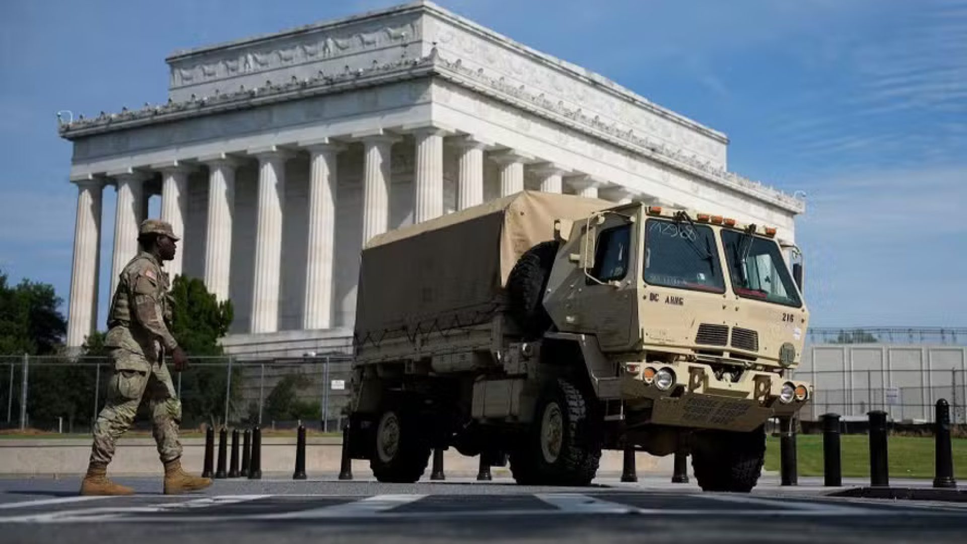 112013697-washington-dc-august-14-a-national-guard-vehicle-is-parked-near-the-lincoln-memorial.jpg