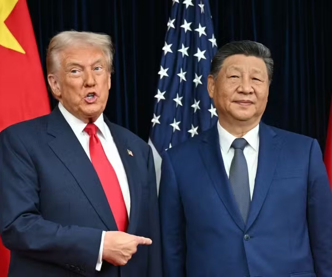 112859967-topshot-us-president-donald-trump-l-and-chinas-president-xi-jinping-greet-each-othe.jpg