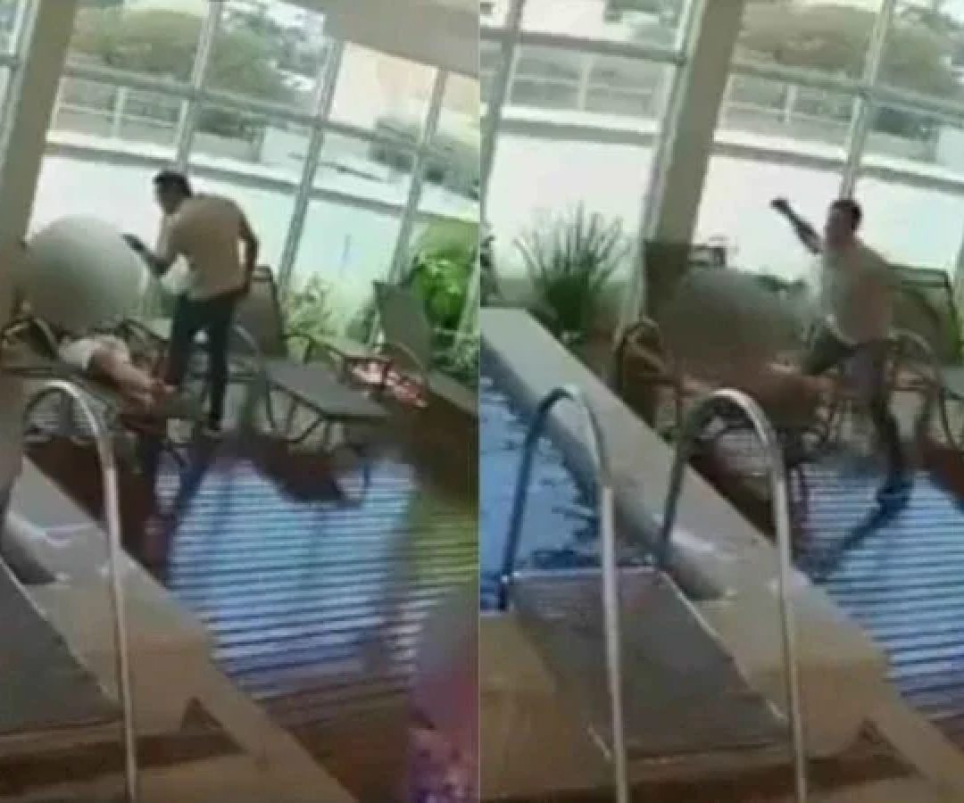 Nas imagens registradas pelas câmeras de segurança do local é possível ver momento em que o agressor aborda a vítima, que estava sentada em uma cadeira de praia -  (crédito: Reprodução/Portal g1)