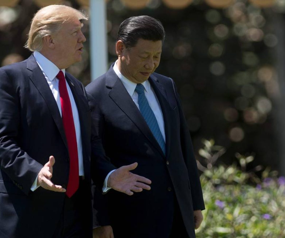 66201808_US-President-Donald-Trump-L-and-Chinese-President-Xi-Jinping-R-walk-together-at-the-Mar.jpg