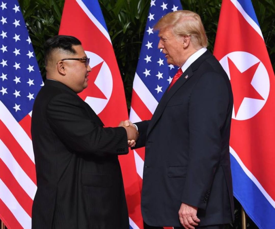 77267162_North-Korea27s-leader-Kim-Jong-Un-L-shakes-hands-with-US-President-Donald-Trump-R-at-the-st.jpeg