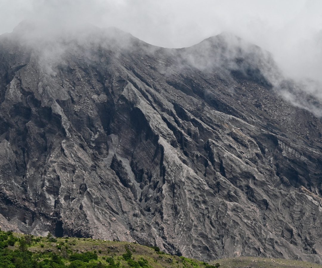 AFP__20250622__63B36T4__v1__HighRes__JapanTourismVolcano-scaled.jpg