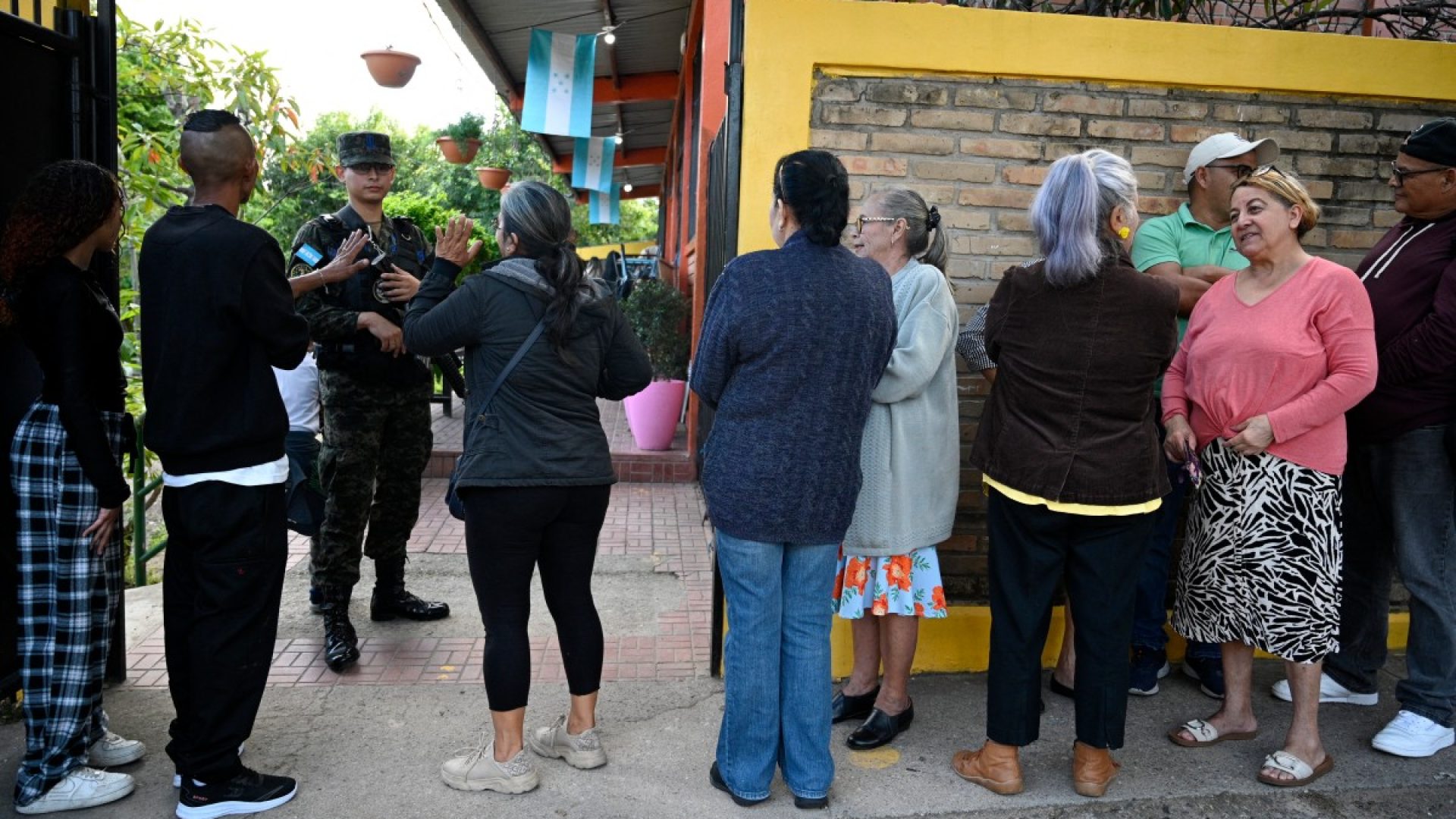 AFP__20251130__86LR9DT__v1__MidRes__HondurasElectionVote.jpg